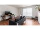 Living room with sofa and wood floors at 625 S Royal Crest Cir # 23, Las Vegas, NV 89169