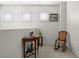 Upstairs hallway with seating area and built-in shelving at 6748 Wormwood Ln, Las Vegas, NV 89148