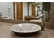 Modern bathroom sink with patterned bowl and sleek faucet at 7045 Edna Ave, Las Vegas, NV 89117