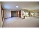 Large bedroom with ample closet space and carpeting at 7045 Edna Ave, Las Vegas, NV 89117