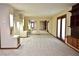 Large bonus room with mirrored closets and carpet flooring at 7045 Edna Ave, Las Vegas, NV 89117