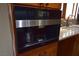 Built-in Miele coffee maker in kitchen cabinetry at 7045 Edna Ave, Las Vegas, NV 89117