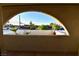 Covered patio with arched window views at 7045 Edna Ave, Las Vegas, NV 89117