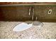 Close-up of wet bar sink with granite countertop at 7045 Edna Ave, Las Vegas, NV 89117
