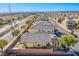 Aerial view of a residential area with houses and streets at 7368 Savannah Falls St, Las Vegas, NV 89131