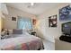 Bedroom with a bed, posters, and a desk at 7455 Snowy Owl St # 102, North Las Vegas, NV 89084