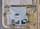 Aerial view of a home with solar panels, a well-kept backyard, and an outdoor living space at 7520 Darian Jane St, Las Vegas, NV 89149