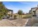 Beautiful backyard with a covered patio and manicured landscaping, ideal for entertaining at 7520 Darian Jane St, Las Vegas, NV 89149