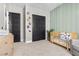 Inviting Bedroom with stylish crib, modern closet, serene ambiance and neutral tones, ideal for a peaceful retreat at 7520 Darian Jane St, Las Vegas, NV 89149