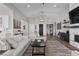 Bright living room featuring high ceilings, stylish decor, and an open layout, creating a welcoming and airy ambiance at 7520 Darian Jane St, Las Vegas, NV 89149