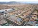 Wide aerial shot of a vibrant residential community with mountain views at 7520 Darian Jane St, Las Vegas, NV 89149