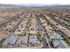Overhead view of a sprawling suburban neighborhood with orderly street layout at 7520 Darian Jane St, Las Vegas, NV 89149