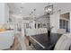 Open-concept layout seamlessly connects the dining area, kitchen, and living spaces at 7520 Darian Jane St, Las Vegas, NV 89149