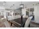 Open-concept layout seamlessly connects the dining area, kitchen, and living spaces at 7520 Darian Jane St, Las Vegas, NV 89149