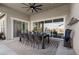Comfortable covered patio with an outdoor dining area and telescopic at 7520 Darian Jane St, Las Vegas, NV 89149