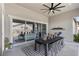 Covered patio with an outdoor dining area, perfect for enjoying meals and relaxing at 7520 Darian Jane St, Las Vegas, NV 89149