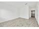 Bright bedroom with wood-look floors and closet at 8725 W Flamingo Rd # 110, Las Vegas, NV 89147