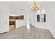 Dining area with hardwood floors and kitchen access at 8725 W Flamingo Rd # 110, Las Vegas, NV 89147