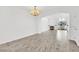 Elegant dining room with chandelier and hardwood floors at 8725 W Flamingo Rd # 110, Las Vegas, NV 89147