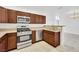 Updated kitchen featuring stainless steel appliances and wood cabinetry at 8725 W Flamingo Rd # 110, Las Vegas, NV 89147