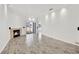 Spacious living room with a fireplace and wood-look floors at 8725 W Flamingo Rd # 110, Las Vegas, NV 89147