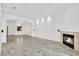 Open living room with hardwood floors and a cozy fireplace at 8725 W Flamingo Rd # 110, Las Vegas, NV 89147