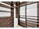 Large walk-in closet with shelving and drawers at 8725 W Flamingo Rd # 110, Las Vegas, NV 89147