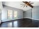 Bright living room featuring hardwood floors, fireplace and ceiling fan at 911 Pescados Dr, Las Vegas, NV 89123