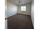 Bright bedroom with ceiling fan and carpeting at 9217 Placer Bullion Ave, Las Vegas, NV 89178