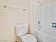 Well-lit bathroom with a white toilet and a shower-tub combination at 1069 Appleblossom Time Ave, North Las Vegas, NV 89031