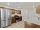 Kitchen featuring stainless steel appliances, wood cabinets, recessed lighting, and tile floors at 1069 Appleblossom Time Ave, North Las Vegas, NV 89031