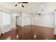 Spacious living room featuring hardwood floors, ceiling fans, and recessed lighting at 1069 Appleblossom Time Ave, North Las Vegas, NV 89031