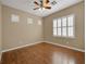 Bright bedroom with wood floors and window at 1551 Boundary Peak Way, Las Vegas, NV 89135