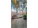 Landscaped backyard with mature trees and stone pathway at 1825 Ann Greta Dr, Las Vegas, NV 89108