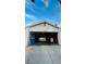 Attached garage with space for one car and additional storage at 1825 Ann Greta Dr, Las Vegas, NV 89108