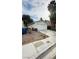 House exterior with a white garage and driveway at 1825 Ann Greta Dr, Las Vegas, NV 89108