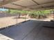 Expansive backyard featuring a covered patio area and potential for landscaping or outdoor activities at 1901 Belmont St, North Las Vegas, NV 89030