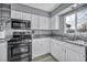 Bright kitchen with granite countertops, a stainless steel gas range, and ample cabinet space at 2009 Los Altos St, Las Vegas, NV 89102