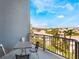 Relaxing balcony with seating offers stunning city views and blue skies above on a clear day at 211 E Flamingo Rd # 412, Las Vegas, NV 89169