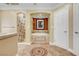 Elegant bathroom featuring a luxurious soaking tub and a separate tiled shower at 2410 Doherty Way, Henderson, NV 89014