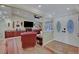 Spacious living room with a fireplace and built-in cabinetry at 2410 Doherty Way, Henderson, NV 89014