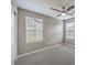 Neutral bedroom with carpet and a ceiling fan for comfortable living at 2436 Padulle Pl, Henderson, NV 89044