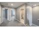 Hallway leading to rooms, offering open passage between the house sections at 2436 Padulle Pl, Henderson, NV 89044