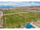 Vast green sports field for various activities, providing a recreational space for the community at 2436 Padulle Pl, Henderson, NV 89044