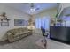 Home office with built-in shelves and comfortable seating at 2437 Desert Butte Dr, Las Vegas, NV 89134