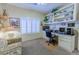 Spacious home office with desk and built-in shelving at 2437 Desert Butte Dr, Las Vegas, NV 89134