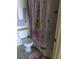Charming bathroom with fun, unicorn-themed shower curtain at 2606 S Durango Dr # 279, Las Vegas, NV 89117