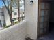 View from a balcony showing the exterior and wooden door at 2638 Aracatuba Ave, Las Vegas, NV 89121