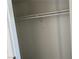 An empty white closet with a clothing rod at 2638 Aracatuba Ave, Las Vegas, NV 89121