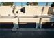 Showing an exterior view of townhouse garages and rooftop features at 2638 Aracatuba Ave, Las Vegas, NV 89121